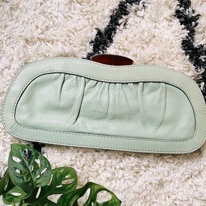Mint green clutch